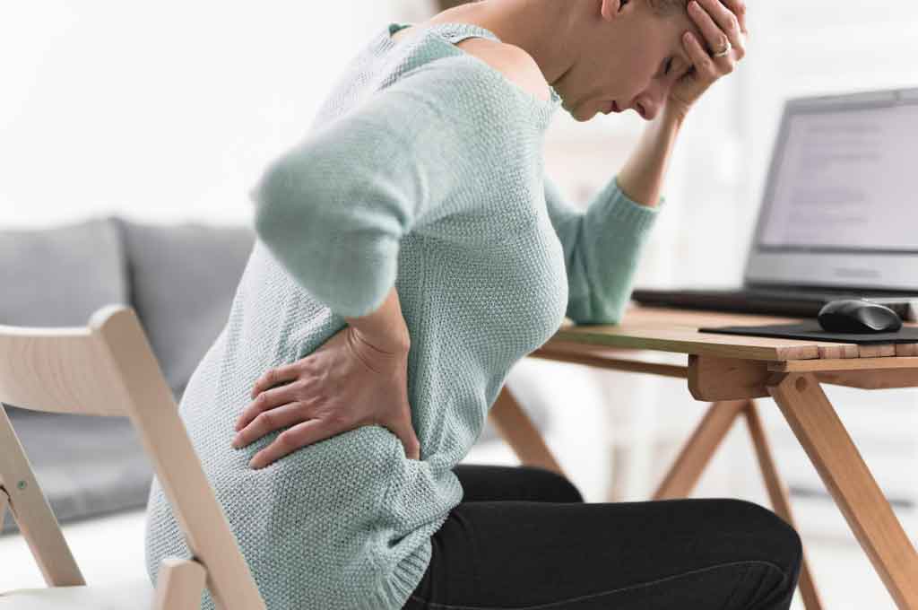 Woman with severe hip pain